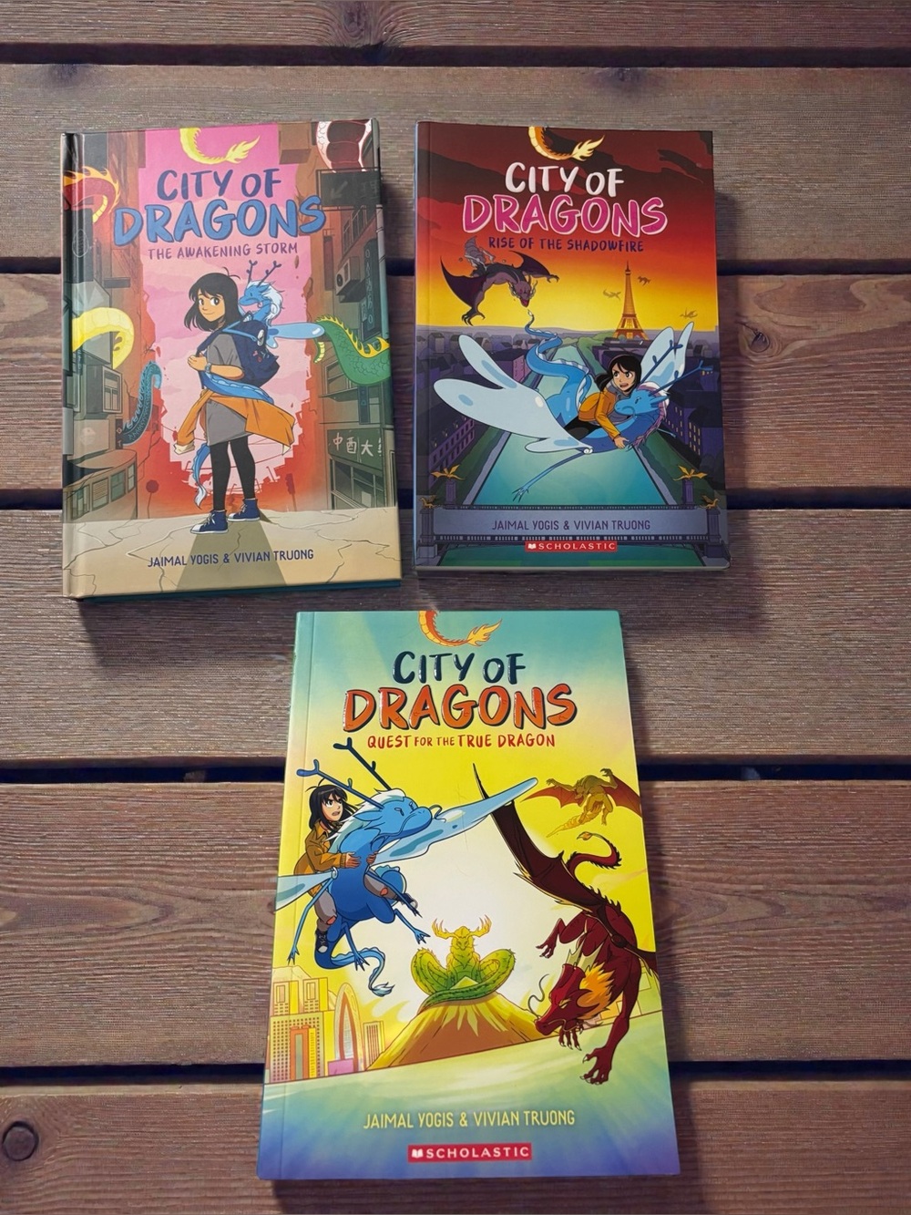 Scholastic City of Dragons Trilogy – Graphic Novels- Like New Condition